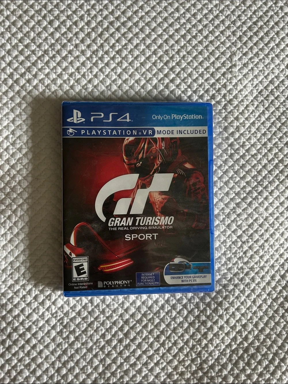 Sony PlayStation 4 Game Case with Red and Black Racing Artwork